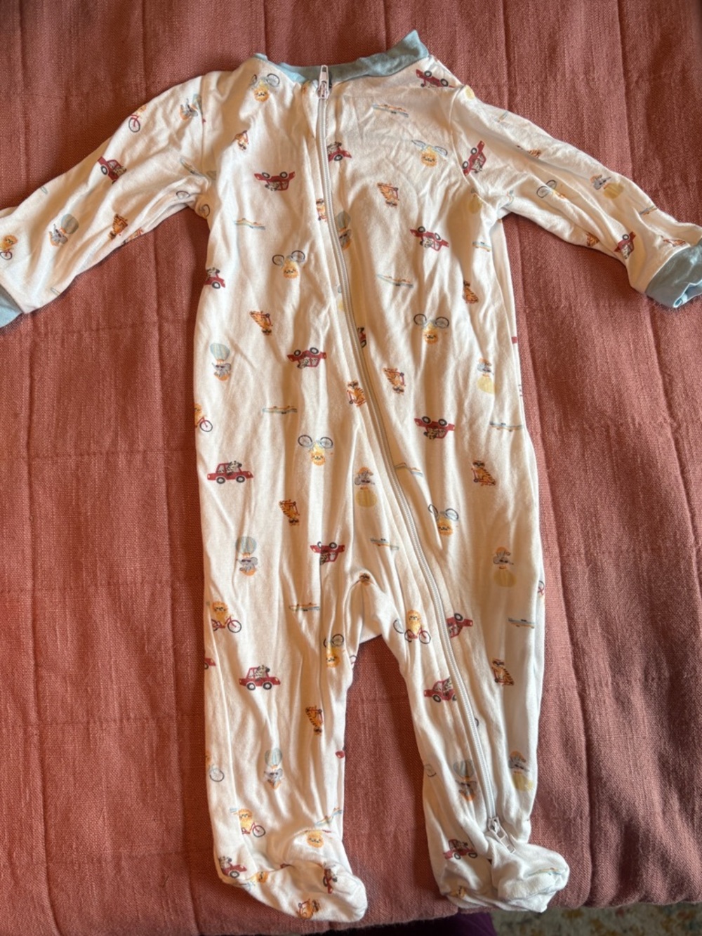 Milkberry Soft White Footed Baby One-Piece with Playful Vehicle Print